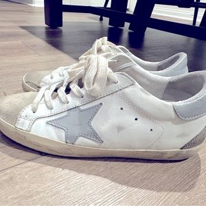 Golden Goose low-top sneakers in suede and two-tone leather.